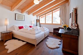 Mountain Exposure Luxury Chalets & Penthouses & Apartments