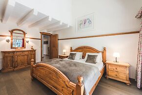 Mountain Exposure Luxury Chalets & Penthouses & Apartments