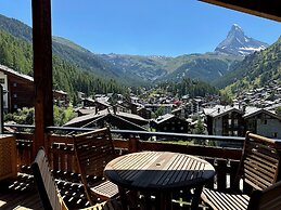 Mountain Exposure Luxury Chalets & Penthouses & Apartments