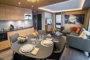 Mountain Exposure Luxury Chalets & Penthouses & Apartments