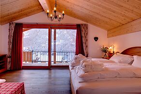 Mountain Exposure Luxury Chalets & Penthouses & Apartments