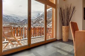 Mountain Exposure Luxury Chalets & Penthouses & Apartments
