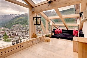 Mountain Exposure Luxury Chalets & Penthouses & Apartments