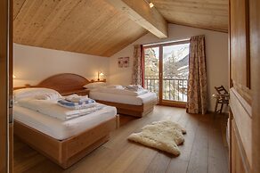 Mountain Exposure Luxury Chalets & Penthouses & Apartments