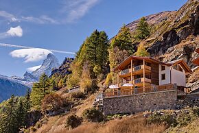 Mountain Exposure Luxury Chalets & Penthouses & Apartments
