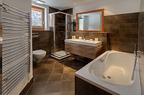 Mountain Exposure Luxury Chalets & Penthouses & Apartments