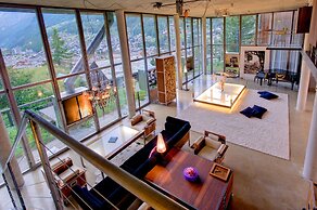 Mountain Exposure Luxury Chalets & Penthouses & Apartments