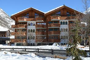 Mountain Exposure Luxury Chalets & Penthouses & Apartments