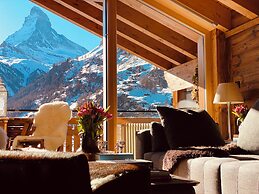Mountain Exposure Luxury Chalets & Penthouses & Apartments