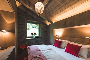 Mountain Exposure Luxury Chalets & Penthouses & Apartments