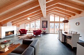 Mountain Exposure Luxury Chalets & Penthouses & Apartments