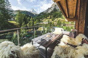 Mountain Exposure Luxury Chalets & Penthouses & Apartments