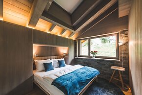 Mountain Exposure Luxury Chalets & Penthouses & Apartments