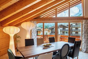 Mountain Exposure Luxury Chalets & Penthouses & Apartments