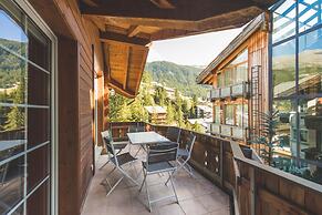 Mountain Exposure Luxury Chalets & Penthouses & Apartments