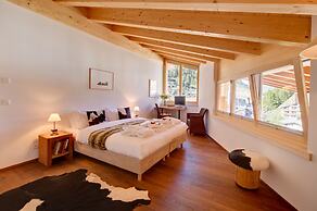 Mountain Exposure Luxury Chalets & Penthouses & Apartments