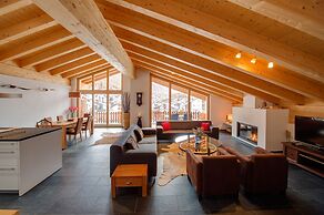 Mountain Exposure Luxury Chalets & Penthouses & Apartments
