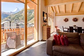 Mountain Exposure Luxury Chalets & Penthouses & Apartments