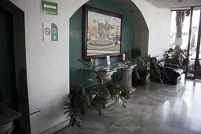 Estanza Hotel & Suites