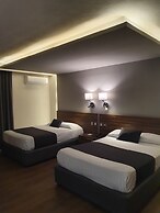 Estanza Hotel & Suites