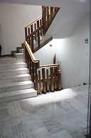 Estanza Hotel & Suites