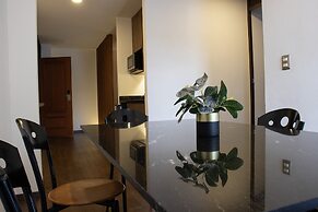 Estanza Hotel & Suites