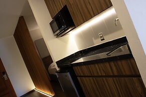 Estanza Hotel & Suites