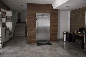 Estanza Hotel & Suites