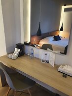 Estanza Hotel & Suites