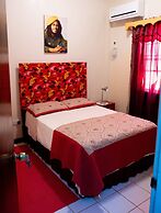 Tropical Breeze Guesthouse and Furnished Apartments