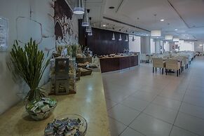 Giannoulis – Almyra Hotel & Village