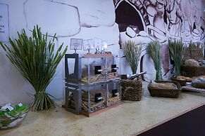 Giannoulis – Almyra Hotel & Village