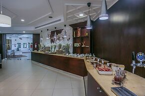 Giannoulis – Almyra Hotel & Village