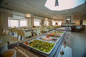 Giannoulis – Almyra Hotel & Village