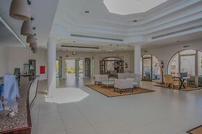 Giannoulis – Almyra Hotel & Village