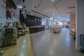 Giannoulis – Almyra Hotel & Village