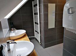 Cukrarna Hostel