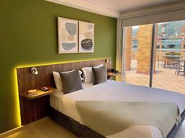 122 Plaza Apartahotel