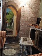 Little House With Fireplace And Terrace In Natural Environment