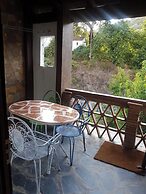 Little House With Fireplace And Terrace In Natural Environment