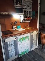 Little House With Fireplace And Terrace In Natural Environment