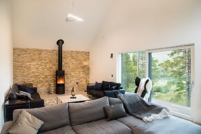 An Caisteal Lodge With Cascading Waterfall View