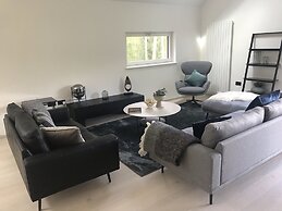 An Caisteal Lodge With Cascading Waterfall View