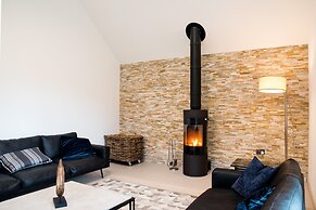 An Caisteal Lodge With Cascading Waterfall View