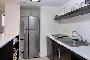 State of the Art beach front Condo