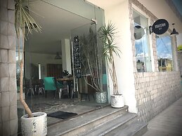 Cálido Cosmos Hotel