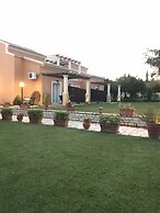 Room in Apartment - L'eremo Luxury Messonete