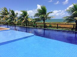 IT04 Bangalo Duplex 3 Suítes Pe na Areia