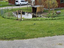 Vestavind Hytter og Rom