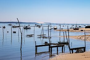 Poolside Escape by Arcachon